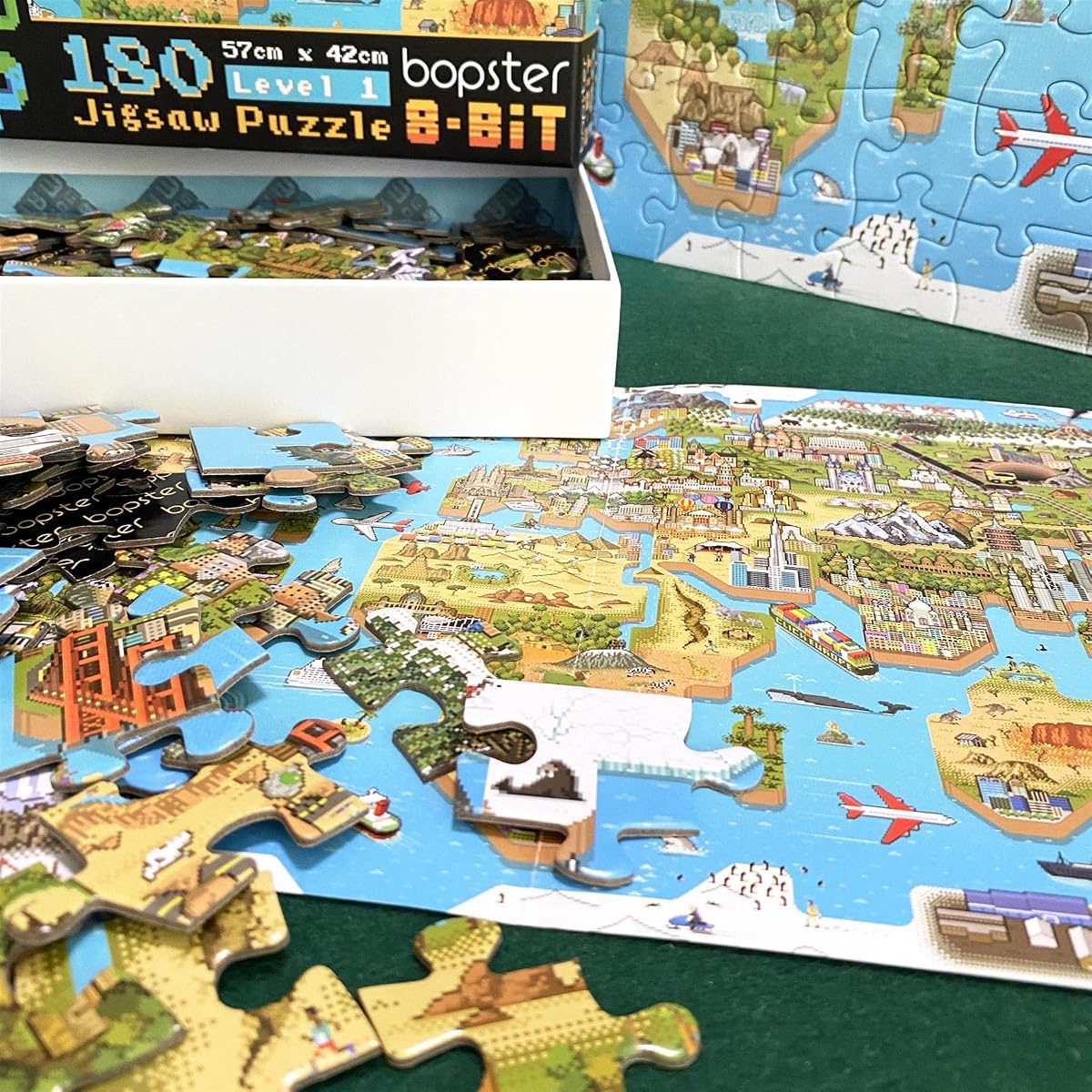 bopster 8-Bit World Map Puzzle — 180 Pieces held in the hand